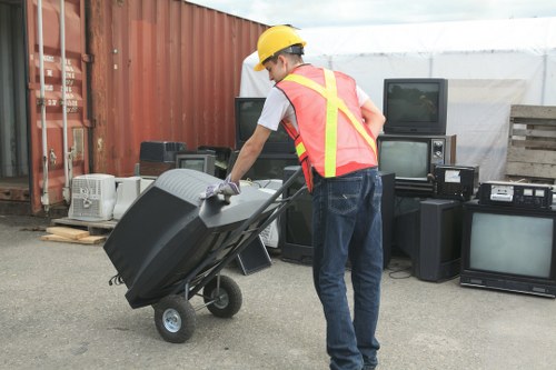 Professional junk removal service handling furniture